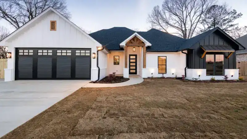 single-story white house with black trim